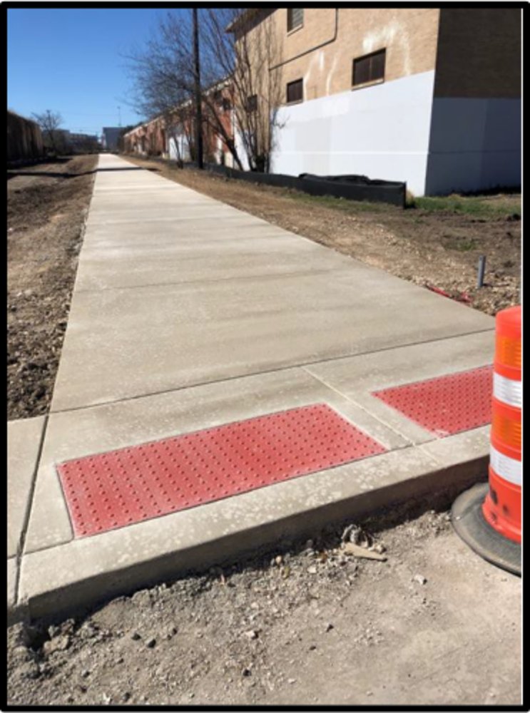 image of sidewalk construction at South Flores Street