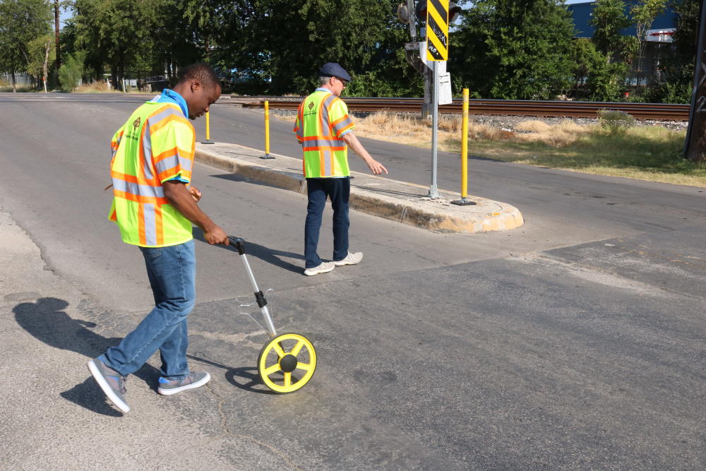 transportation department engineers auditing quiet zone railroad crossing